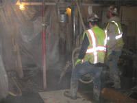 Monitoring worker exposures to airborne hazards during interior drilling operations